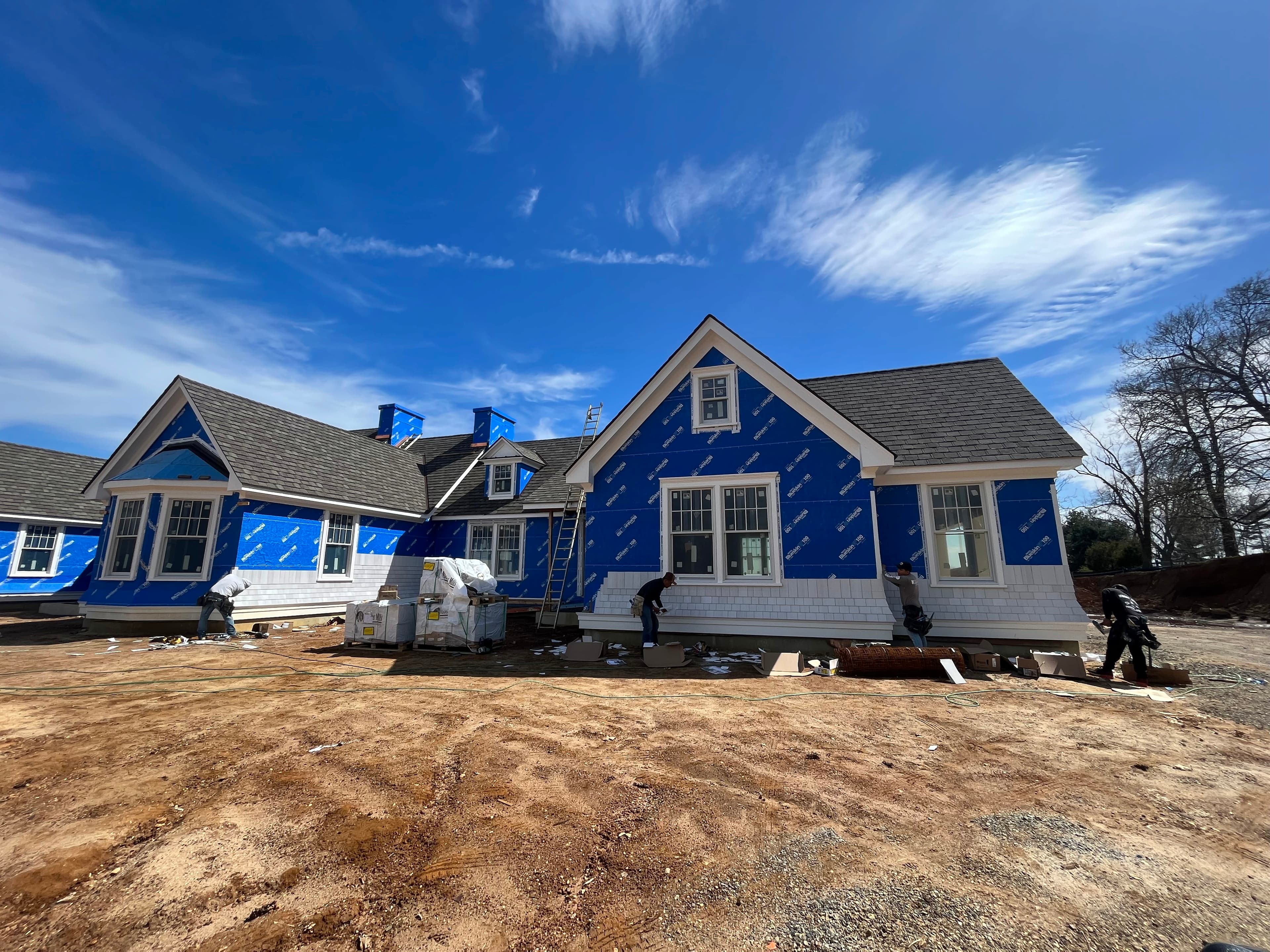 A custom home progressing under active field oversight
